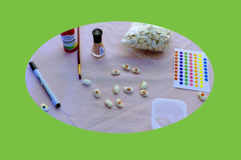 butter beans made into counting beans by adding coloured dots to one side of each bean