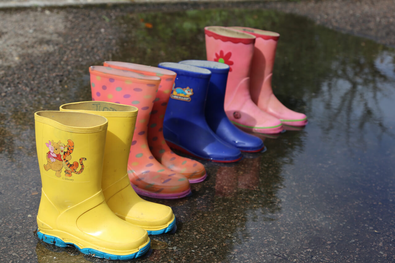 eight wellington boots, four pairs